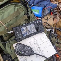 a portable ham radio kit with logbook