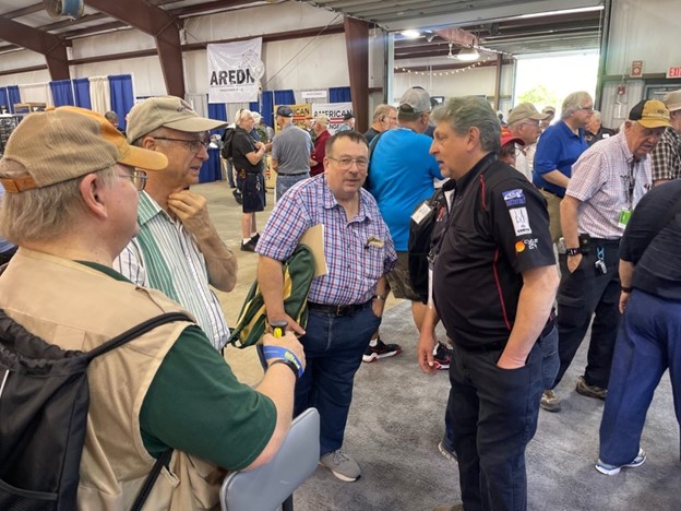 dx engineering tech speaking with customers at hamvention