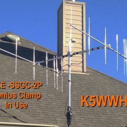 ham radio antenna array near a residential home rooftop