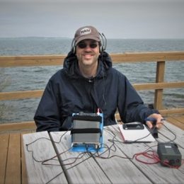 ham radio operate at portable station on dock near ocean