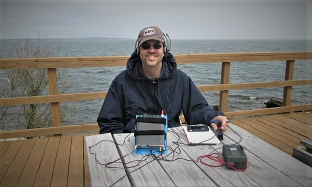 ham radio operate at portable station on dock near ocean