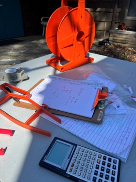 workbench with notepad and calculator