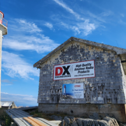 CY9C DXpedition lighthouse shot with DX Engineering Banner