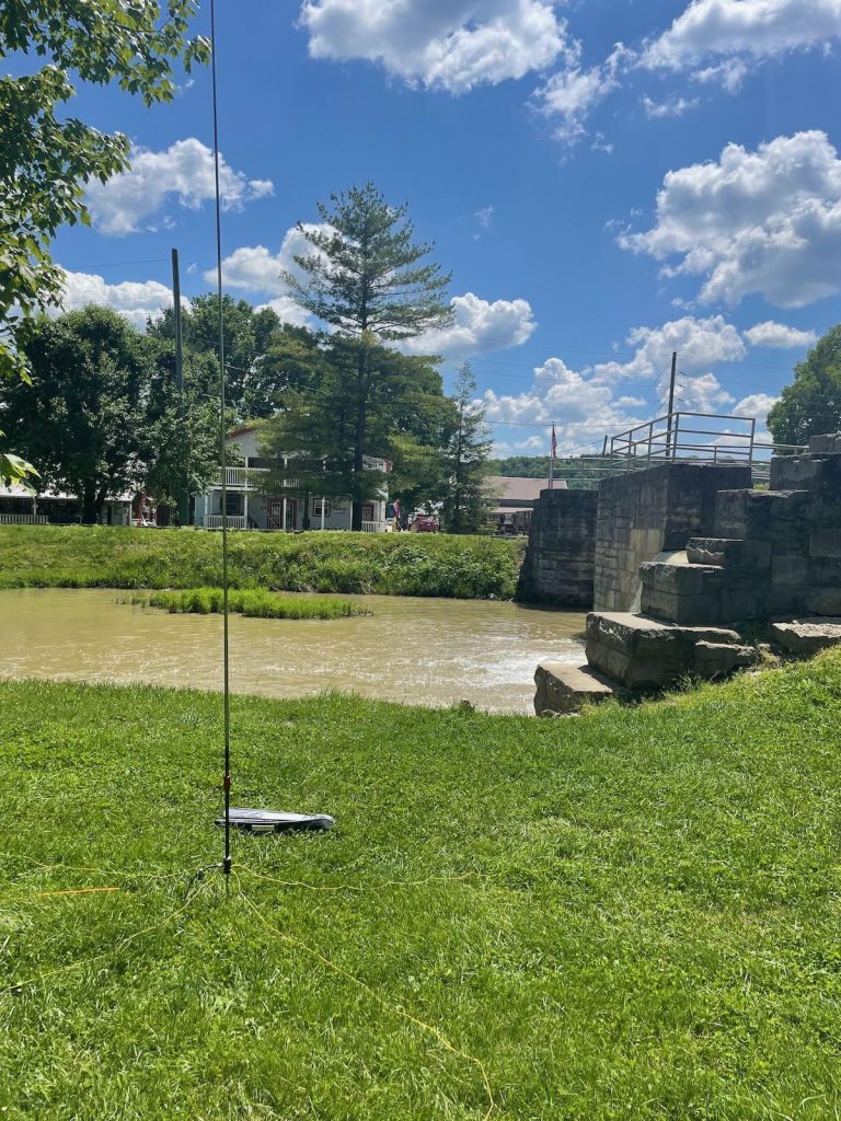 portable ham antenna set up near riverbank