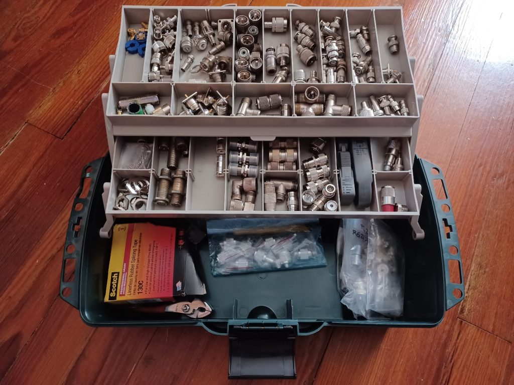 tackle box filled with electrical parts