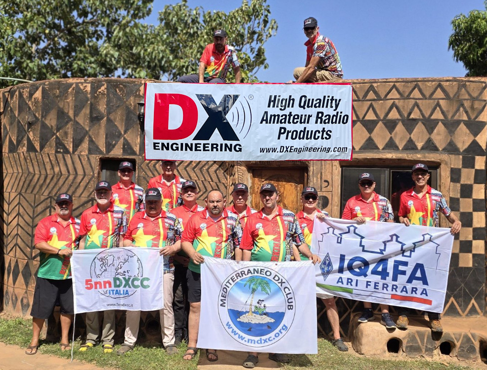 XT2MD DXpedition team with sponsor banners