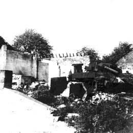 black and white photo of a us army tank in the ardenne