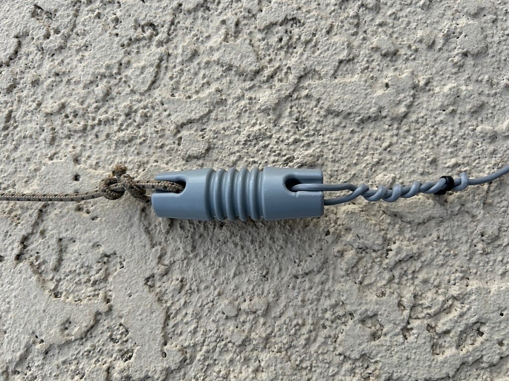 close up of a joint coupler on a wire antenna