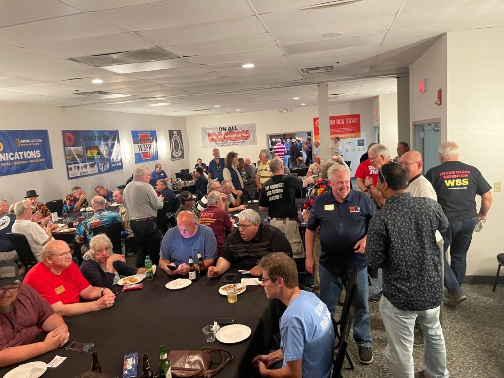 folks eating dinner at contest university 