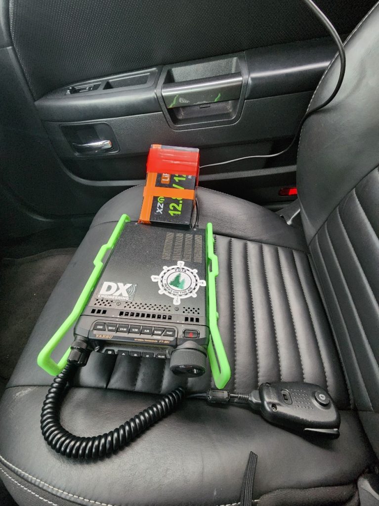 ham radio on a car's passenger seat